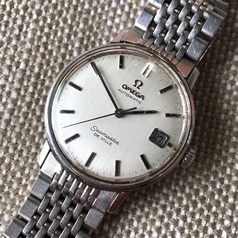 omega seamaster deville stainless.